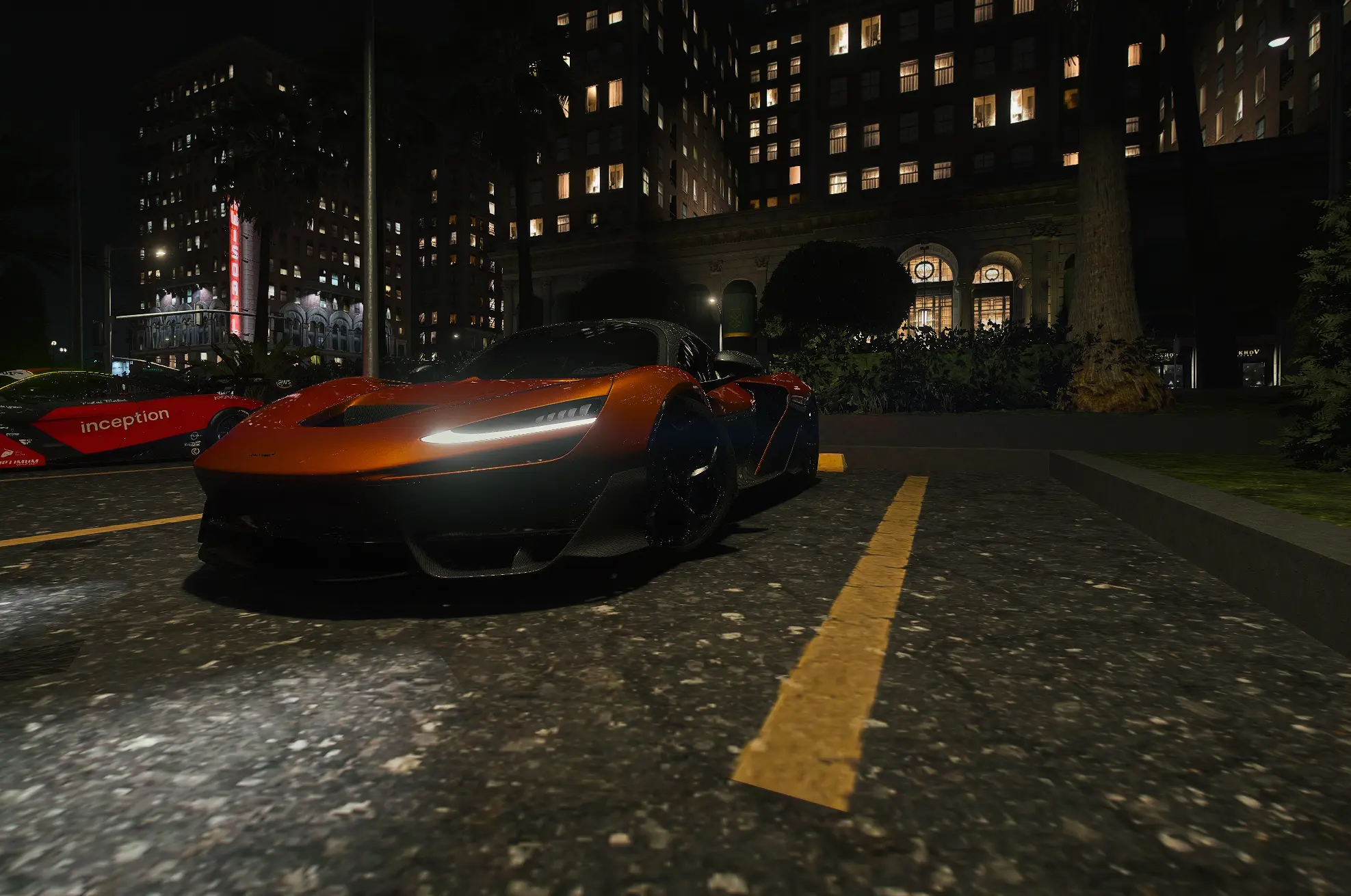 Orange supercar on a dark street