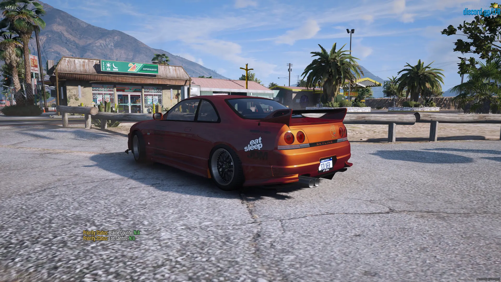 Widebody import with a rear wing under the palms